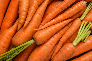 Fresh carrots as background, closeup