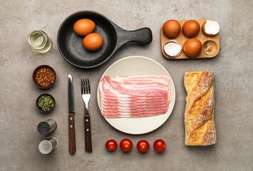 Composition with ingredients for preparing tasty fried eggs on grunge background