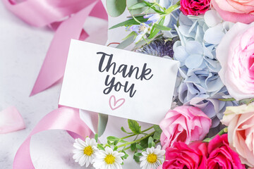 Thank you card with blossom flower and pink ribbons