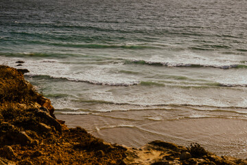 waves on beach sunset