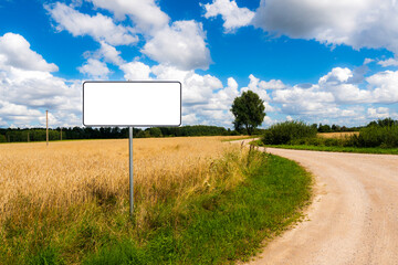 A country road with an empty road signpost