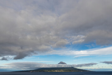 Pico Volcano / View from the island of Faial to the island of Pico with the volcano Pico, the highest mountain in the Azores and Portugal.