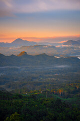 Obraz premium sunrise behind the mountain
