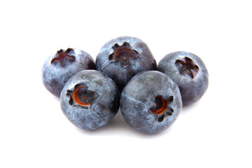 Ripe blueberries are blue-purple on an isolated background. White background. Useful berry