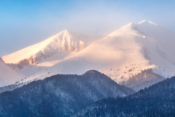 Bansko, Bulgaria travel winter landscape panorama of snow Pirin mountain peaks at sunrise