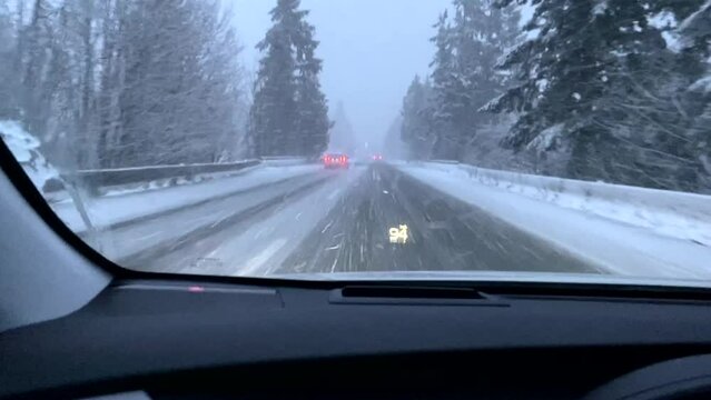 Riding through the snow on a highway in Abbotsford, Canada
