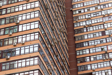 Obraz premium Fragment of residential apartment with flat buildings exterior.