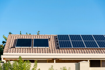 Solar panels on the roof of resedential building. Renewable solar energy.