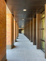 Empty covered alley along the building