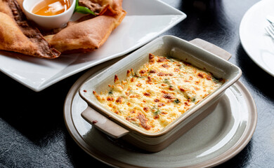Baked Spinach with Cheese, homemade baked cheese and onion filo quiche Ready to serve on the table