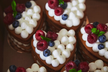 Festive natural french tart with fresh berries close up. Sugar and gluten free handmade dessert