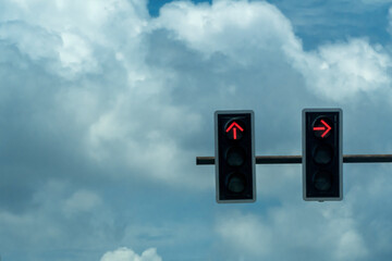 Red traffic light on the sky