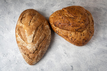 Top of view of two molds of cereal rye bread. Sourdough bread concept
