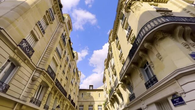 Camera movement along Parisian French streets with old houses. Low Angle Shooting