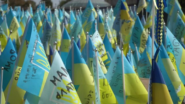 Place of memory of those killed in the Ukrainian-Russian war, flags of Ukraine with the names of the dead, Maidan, Kyiv, Ukraine