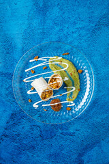 Mexican chicken and cheese burrito with guacamole and ranch sauce