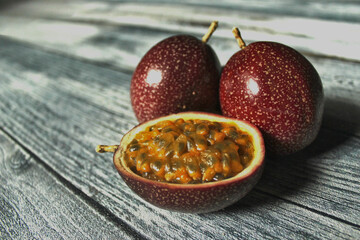 passion fruit on white wooden backdrop