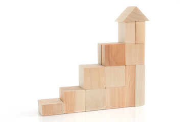 Business concept growth success process, statistics graph. Wooden blocks stacking as an arrow up averages as a growth graph chart on white background.