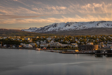 Beautiful view of Akureyri’s Old Town at Sunset from a high point in a summer day.