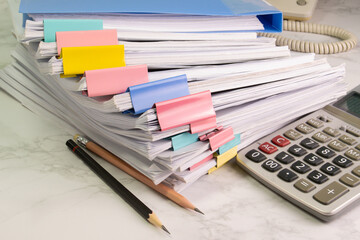 document paper of business report paper file on the table with pencil and calculator, concept document in work office