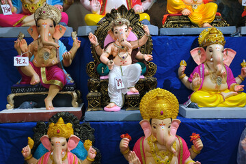 19 August 2022, Pune, India, Ganesha or Ganapati for sale at a shop on the event of Ganesh festival in India, Eco friendly God Ganesha Statue made from clay.