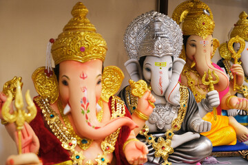 19 August 2022, Pune, India, Ganesha or Ganapati for sale at a shop on the event of Ganesh festival in India, Eco friendly God Ganesha Statue made from clay.