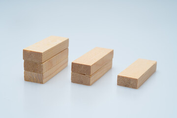 Expressing various concepts such as dominoes and business using wood jenga