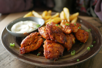 close up of slice of grill chicken on a plate 