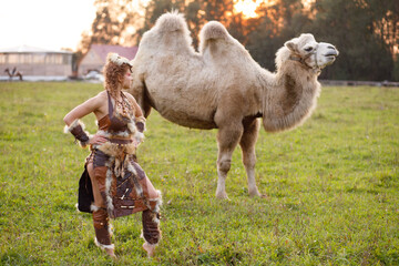 beautiful photo of a girl and a camel