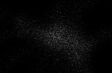 Fototapeta na wymiar Dust particles effect vector splatter on black background texture. Dust overlay noise dirt background.