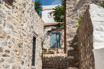 Fototapeta na wymiar Street in small mediterranean town in sunny summer day