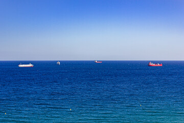 Fototapeta premium Views of oil tankers and cruise ships at sea, ocean