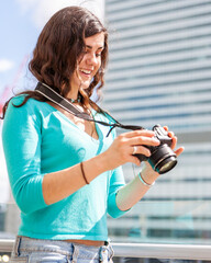Teenage Students, a good shot. A college student working on her photographic skills in an urban...