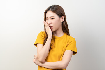 beauty woman checking oral smell isolated on background