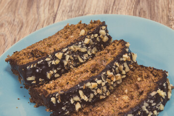 Pieces of zucchini dough with nuts and raisins. Delicious dessert