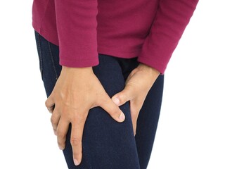Thigh pain or muscle cramp in asian woman with on white background using for health care concept....