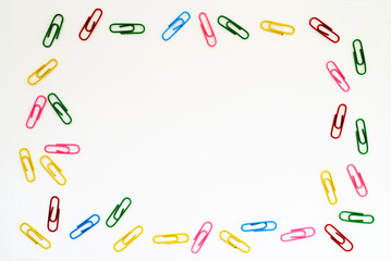 school frame in the form of paper clips on a white background