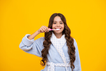 Fototapeta premium Night brushing teeth. Dental care, hygiene and child. Teenage girl with toothbrush brushing teeth.