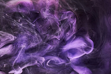 Purple lilac multicolored smoke abstract background, acrylic paint underwater explosion