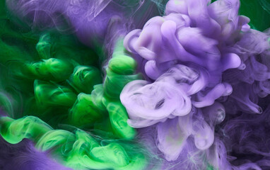 Fototapeta premium Green purple smoke abstract background, acrylic paint underwater explosion