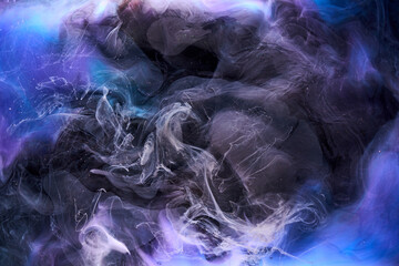 Blue black multicolored smoke abstract background, acrylic paint underwater explosion