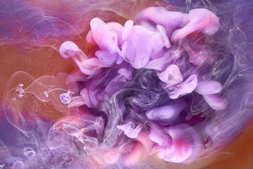 Multicolored orange lilac smoke abstract background, acrylic paint underwater explosion