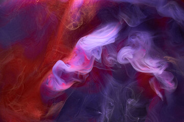 Blue red colorful smoke abstract background, acrylic paint underwater explosion