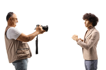 Photographer taking a photo of a young male model
