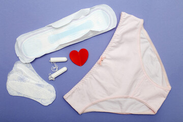 women's briefs with tampons, pads and panty liners . hygiene and women's health care concept