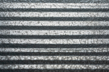 Shiny gray corrugated metal abstract background in horizontal formation