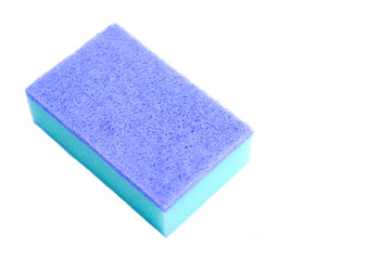 Colorful cleaning sponge for scrubbing dishes or other purposes on white background. Concept : household washing tools, equipment in kitchen.