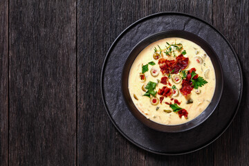 Beer cheese soup in bowl, top view