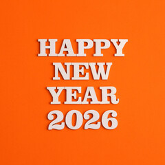 Happy new year 2026 in wooden letters on orange background