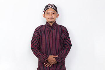 portrait asian man with javanese traditional cloth lurik isolated on white background